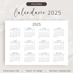 a white calendar with the italian language and numbers on it, in front of a floral background