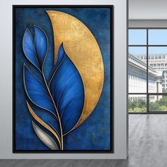 a blue and gold leaf painting on a wall in an empty room with large windows