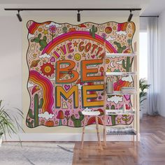 a colorful wall mural with the words be me on it