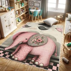 an elephant rug with pink flowers on it in a child's playroom area