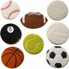 decorated cookies with different sports designs on them