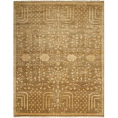 a brown and beige rug with an intricate design