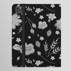 the black and white floral pattern is shown on this phone case, which features an image of