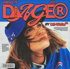 a magazine cover with a woman wearing a baseball cap on top of her head and long hair blowing in the wind