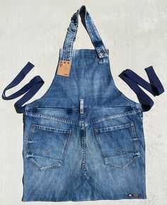 an apron made out of jeans with straps