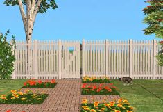 a dog standing in the middle of a flower garden next to a white picket fence