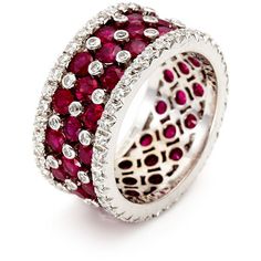 a white gold ring with red and white diamonds on the inside, set in 18k white gold