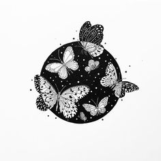 a black and white drawing of butterflies flying in the air over a circular object with dots