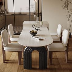 a dining room table with chairs around it