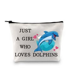 a white pouch bag with a dolphin on it and the words just a girl who loves dolphins