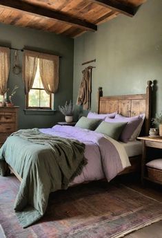 a bedroom with a bed, dressers and windows in it's center area