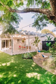 the back yard is clean and ready to be used as an outdoor space for entertaining