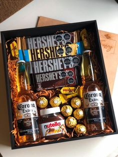 an assortment of liquor and chocolates in a gift box