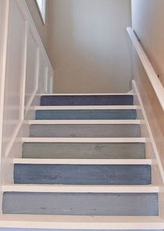 the stairs are painted blue and gray