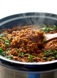 some food is being cooked in a pan