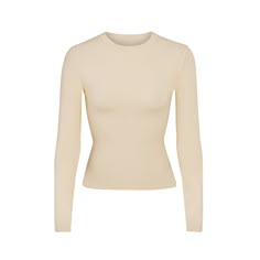 This super soft and buttery long sleeve tee molds to your body, making it perfect for everyday wear. Lightweight and breathable, this long sleeve tee is an ideal piece for added coverage without being constrictive or overly warm. Shapewear, Long Sleeve Tee, Christmas List, Dream Wardrobe, Capsule Wardrobe, Wardrobe Essentials, Long Sleeve T Shirt, Breathable Fabric, Long Sleeve Tshirt