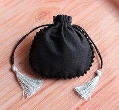 Pretty small black Cotton pouches with Round POMPOM .... Custom Cotton GIFT PURPOSE BAG.... Makeup pouch cotton pouch, cosmetic bag, Customized cotton print bag, personalize coin bag drawstring Set of 100 pouches COLOR-----------> BLACK DRAWSTRING--> COTTON ROPE (SPIRAL) STRING WITH BOTH SIDE TASSEL SIZE --------------> CUSTOM SIZE ARE ALSO AVAILABLE MATERIAL-------> 100% PURE COTTON FABRIC WITH 20X20 SITTING USES-------------> for store the little and precious thing like jewelry, Elegant Black Bag For Personal Use, Black Pouch Bag For Gift, Handmade Black Pouch As Gift, Black Pouch Bag As Gift, Handmade Black Bag For Gift, Handmade Black Bag As Gift, Handmade Black Bag As A Gift, Black Cotton Bags For Gifts, Black Bag With Dust Bag As Gift