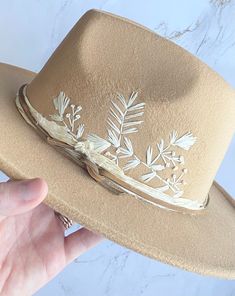 "Hand embroidered, unique, floral embroidered wide brim felt hats. Custom designed hats!  hoods between hat colors, design and band options. These are great hats for family photos, concerts, outdoor get togethers, vacation, sun hat, and more! Super cute and stylish for all occasions.   Listing is split by design and hat color (I.e. black #1 is a black hat with design #1)  Hat details:  65% cotton, 35% polyester One size,but fits all most women Adjustable strap inside of the fedora hat Hat Circumference: 56-58cm/22-22.8\"; Brim Width: 7cm/2.76\"；Height: 11cm/4.3\". if you do not want desired band option-simple black leather band will be provided. FREE SHIPPING" Embroidered Felt Hat, Embroidered Cowboy Hat, Embroidery On Hats, Felt Hats For Women, Hat Embellishments, Cowboy Hat Design, Stray Dog Designs, Hat Burning, Wide Brim Felt Hat