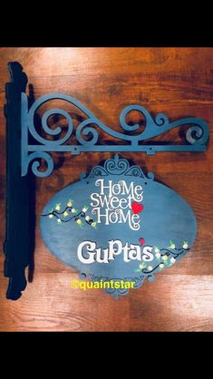 a sign that reads home sweet home gupaas