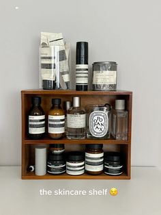 an assortment of skin care products are displayed on a shelf with the words, the skincare shelf