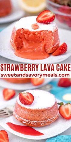 strawberry lava cake with powdered sugar on top and topped with fresh strawberries in the background