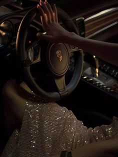 Manicured nails and hand on the steering wheel of a Jaguar brand car. Person wearing sparkling dress. Rich Women Lifestyle, Life Vision Board, Rich Girl Aesthetic, Rich Girl Lifestyle, Rich Lifestyle, Dark Feminine Aesthetic, Luxury Lifestyle Dreams, Rich Women, Foto Poses