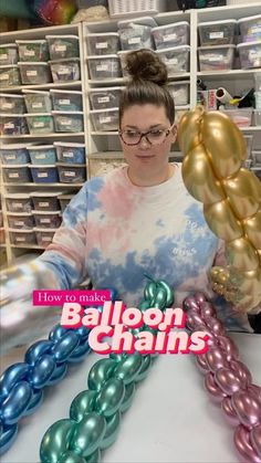 a woman holding balloons in her hands and standing next to it with the text how to make balloon chains