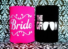 two black and pink can coolers with the words bride and groom printed on them