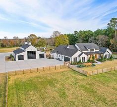 an aerial view of a home in the country