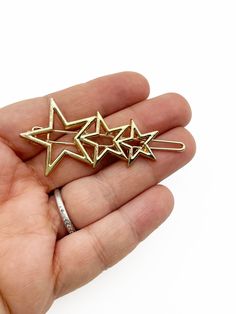 These gold plated star clips are big and bold and they are perfect for filling with resin to make customized hair clips.  You could also use them as they are too.  You will get 2 pieces so you can make a cute paired set.  They are 48x27mm and 58mm long across the length of the clip. Star Clips, Gold Hair Clip, Gold Hair Piece, Blank Hats, Gold Hair Clips, Graduation Hairstyles, Star Hair, Gold Hair, Hair Pin