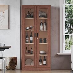 a wooden cabinet filled with bottles and glasses