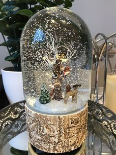 a snow globe sitting on top of a table