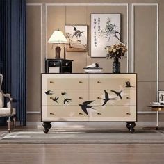 a dresser with birds painted on it in a living room