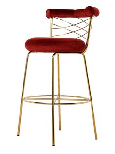 a gold metal bar stool with red velvet upholstered seat and backrests