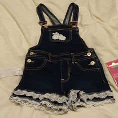 Denim Overalls With Lace And Crochet Detailing And Jeweled Snaps. New With Tags. Size 4t Make An Offer On Any Of My Items. All Reasonable Offers Will Be Considered Especially On Bundles! I'm Highly Motivated To Get Our Closets Cleaned Out! Pokémon Scarlet, Crochet Details, Size 4t, Kids Bottoms, Bundles, Color Blue, Tags