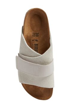 A contoured, cork-textured footbed with a deep heel cup puts support and comfort under every step in a slide sandal topped with a mix of soft leathers. Support: enhances the fit with targeted contouring and cushioning in the footbed Adjustable hook-and-loop strap Contoured, cushioned footbed with arch support Flat sole Leather upper and lining/synthetic sole Made in Germany Birkenstock Kyoto, Recovery Sandals, Flats With Arch Support, Arch Support Shoes, Pretty Shoes Sneakers, Shoe Pattern, Womens Slides, Leather Shoes Woman, Pretty Shoes