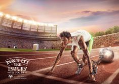 a man in white shirt and green shorts on track next to metal ball with words don't let the injury tie you up