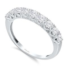 a white gold ring with five rows of diamonds