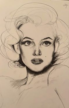 a black and white drawing of a woman's face