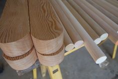 several pieces of wood sitting on top of a wooden table next to some white circles