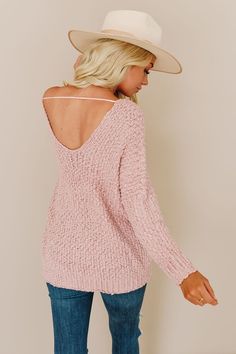 Be someone's 'Snuggle Bunny' this season and enjoy some Netflix in until the weather warms up! This pretty pink v-neck sweater is slightly oversized with a v-neck back and holding strap to keep it slipping. Pair it with your favorite jeans and cute boots for your date night! Available in pink. 80% polyester and 20% acrylic. Imported. Snuggle Bunny, Social Butterfly, Cute Boots, Pretty Pink, V Neck Sweater, Favorite Jeans, Vneck Sweater, Pretty In Pink, Neck Sweater