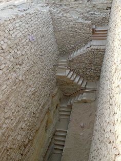 there is a stone staircase going up the hill