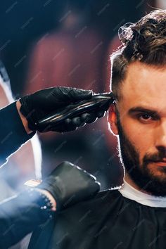 Premium Photo | Close up view of young bearded man that sitting and getting haircut in barber shop Getting Haircut, Beauty Parlour, Mens Haircuts, Bearded Man, Mens Haircuts Fade, Beauty Parlor, Bearded Men, Premium Photo, Haircuts For Men