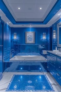 a large bathroom with blue walls and flooring