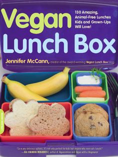 an open lunch box filled with food and veggies