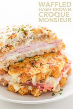 a close up of a sandwich on a plate with the words waffled hashbrown croque monsieur