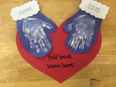 two handprinted hands on top of a red heart with the words cold hands, warm heart