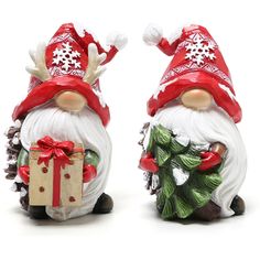 two santa claus figurines with presents in their hands