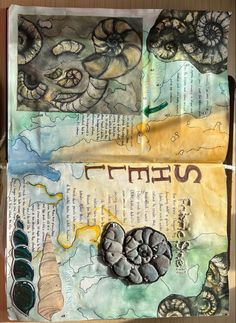 an open book with various pictures and words in hebrew writing on the pages, including mushrooms