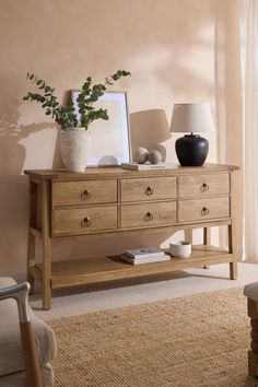 a living room scene with focus on the dresser